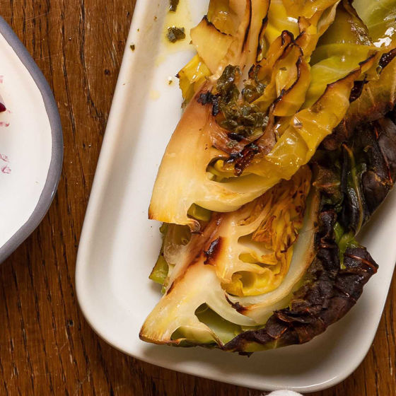 Charred Hispi Cabbage with garden herb butter