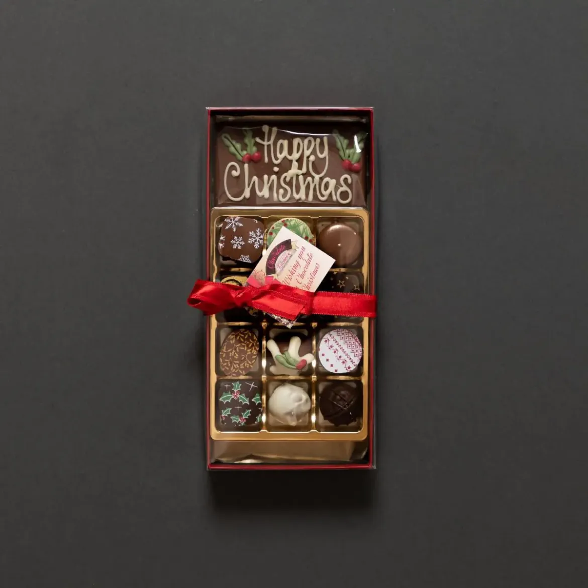 A Selection of 12 Handmade Christmas Chocolates and Happy Christmas Chocolate bar  Perfect to share or to eat by yourself!
